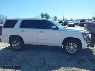 2017 Chevrolet Tahoe Commercial with VIN 1GNSKFEC8HR216301, listed as a IAAI auction lot 41602286 with 160,619 mi miles. Bid and sale history available at carsss.com. Image 13.