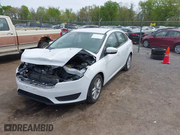 2016 Ford Focus SE with VIN 1FADP3F21GL403121, listed as a IAAI auction lot 42130743 with 103,592 mi miles and . Bid and sale history available at DreamBid. Image 17.