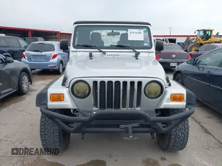 2005 Jeep Wrangler X z VIN 1J4FA39S95P370868, wystawiony jako IAAI lot #42476186 z przebiegiem 144 986 mil mil oraz . Historia ofert i sprzedaży dostępna na DreamBid. Obrazek 12.