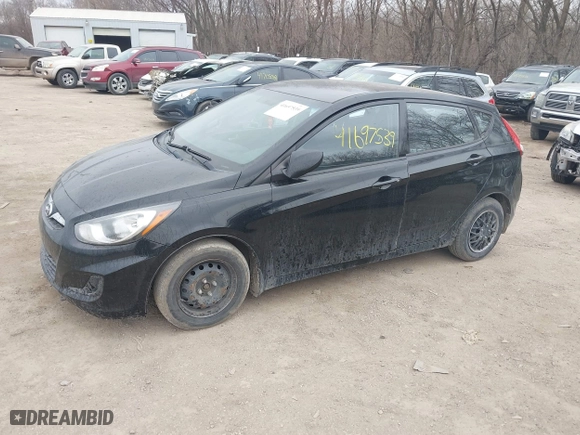 2014 Hyundai Accent GS with VIN KMHCT5AE6EU197814, listed as a IAAI auction lot 41697539 with 228,490 mi miles. Bid and sale history available at carsss.com. Image 2.