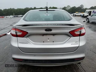2016 Ford Fusion SE Hybrid z VIN 3FA6P0LUXGR350997, wystawiony jako Copart lot #62301825 z przebiegiem 267 537 mil mil oraz Szkoda całkowita • Salvage title. Historia ofert i sprzedaży dostępna na DreamBid. Obrazek 6.
