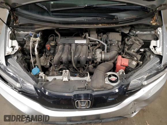 2015 Honda Fit LX с VIN 3HGGK5H56FM720996, выставлен на аукционе Copart как лот 57565945 с пробегом 90 222 миль миль и Списание • Salvage title. История ставок и продаж доступна на DreamBid. Изображение 12.