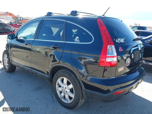 2009 Honda CR-V EX-L with VIN 5J6RE38759L023937, listed as a IAAI auction lot 41736422 with 137,577 mi miles. Bid and sale history available at carsss.com. Image 3.