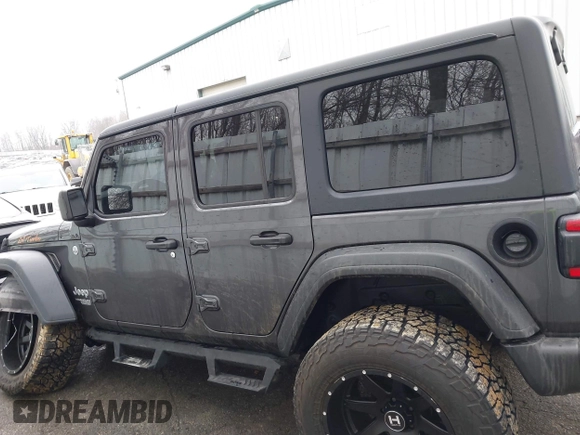 2020 Jeep Wrangler Unlimited Sport z VIN 1C4HJXDN3LW164701, wystawiony jako IAAI lot #41200437 z przebiegiem 102 272 mil mil oraz . Historia ofert i sprzedaży dostępna na DreamBid. Obrazek 14.