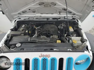 2016 Jeep Wrangler Unlimited Sport with VIN 1C4HJWDG1GL200419, listed as a Copart auction lot 53668335 with 111,835 mi miles and Salvage title. Bid and sale history available at DreamBid. Image 12.