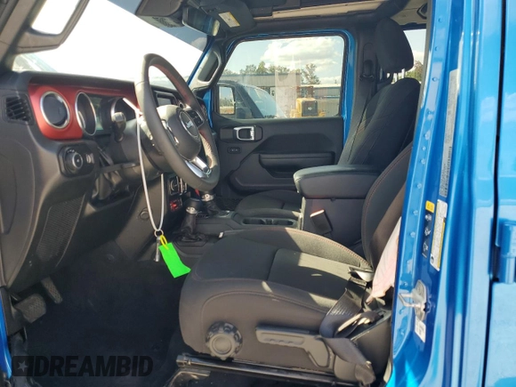 2023 Jeep Wrangler Rubicon with VIN 1C4HJXFN5PW504658, listed as a Copart auction lot 69063484 with 32,490 mi miles and Salvage title. Bid and sale history available at DreamBid. Image 7.