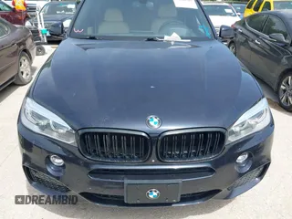 2014 BMW X5 xDrive50i with VIN 5UXKR6C55E0C03743, listed as a IAAI auction lot 42268302 with 118,892 mi miles and . Bid and sale history available at DreamBid. Image 6.