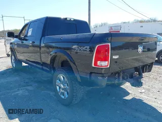 2018 Ram 2500 Laramie with VIN 3C6UR5NL5JG315081, listed as a IAAI auction lot 41858055 with 181,169 mi miles. Bid and sale history available at carsss.com. Image 3.