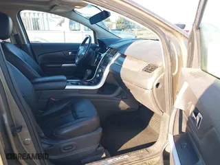 2013 Ford Edge SEL with VIN 2FMDK4JC5DBA97837, listed as a IAAI auction lot 41549296 with 128,943 mi miles. Bid and sale history available at carsss.com. Image 5.