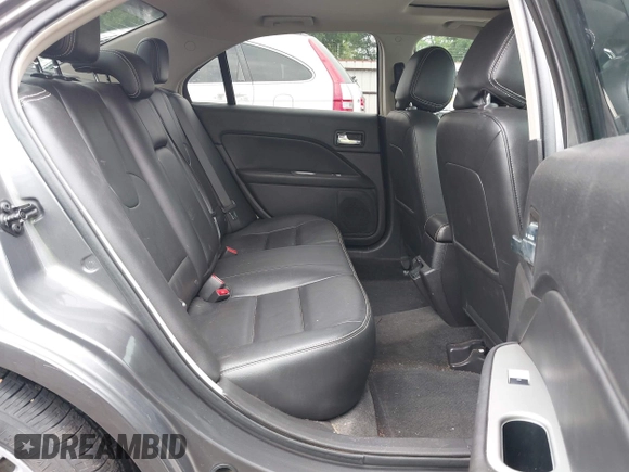 2012 Ford Fusion Hybrid z VIN 3FADP0L33CR289548, wystawiony jako IAAI lot #41905806 z przebiegiem 121 233 mil mil oraz . Historia ofert i sprzedaży dostępna na DreamBid. Obrazek 8.