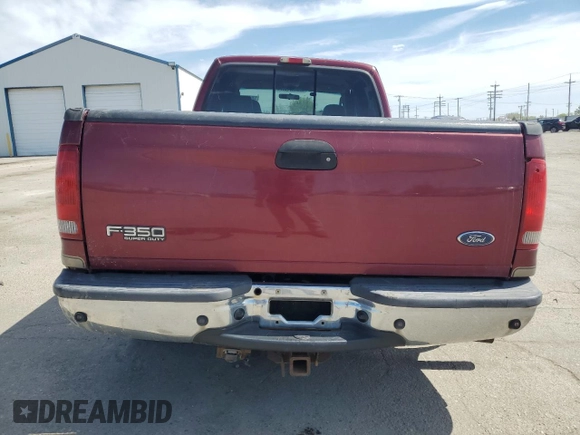 2004 Ford F-350 XL with VIN 1FTSW31P54EC27424, listed as a Copart auction lot 53072375 with 209,579 mi miles and Salvage Title. Bid and sale history available at DreamBid. Image 6.
