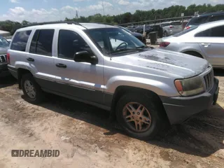 2004 Jeep Grand Cherokee Laredo z VIN 1J4GW48SX4C309998, wystawiony jako IAAI lot #42307167 z przebiegiem 306 912 mil mil oraz . Historia ofert i sprzedaży dostępna na DreamBid. Obrazek 1.