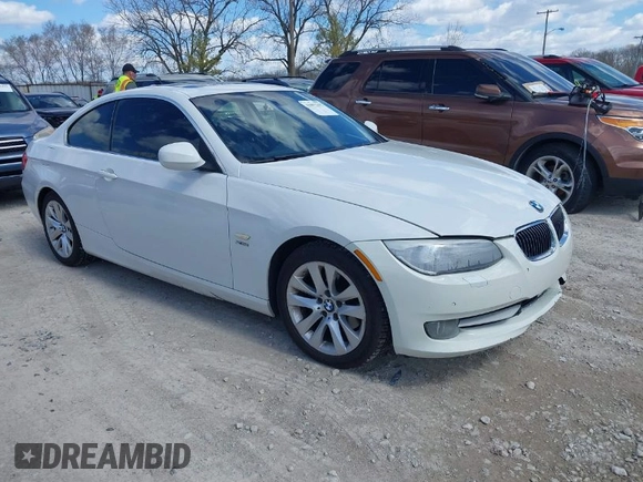 2013 BMW 3 Series 328i xDrive with VIN WBAKF3C52DJ385588, listed as a IAAI auction lot 41892255 with 150,061 mi miles. Bid and sale history available at carsss.com. Image 1.