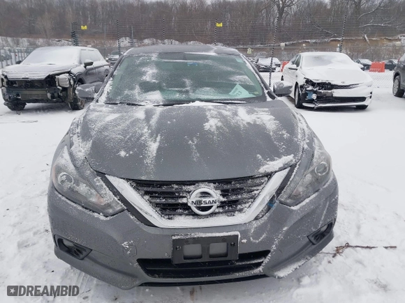 2018 Nissan Altima 2.5 SV with VIN 1N4AL3AP0JC136949, listed as a IAAI auction lot 41572923 with 69,000 mi miles. Bid and sale history available at carsss.com. Image 12.