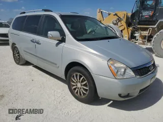 2012 Kia Sedona EX with VIN KNDMH4C72C6459882, listed as a Copart auction lot 77481744 with 136,947 mi miles and Salvage Title. Bid and sale history available at carsss.com. Image 4.