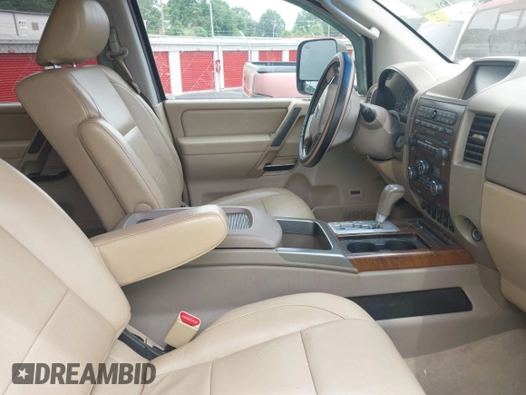 2010 Nissan Titan SE with VIN 1N6BA0ED4AN323907, listed as a IAAI auction lot 42113512 with 198,530 mi miles. Bid and sale history available at carsss.com. Image 5.