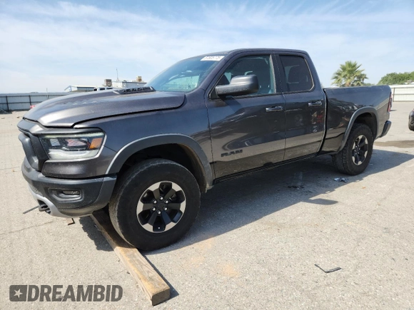 2019 Ram 1500 Rebel z VIN 1C6SRFET7KN875819, wystawiony jako Copart lot #57805775 z przebiegiem 80 521 mil mil oraz Szkoda całkowita • Salvage title. Historia ofert i sprzedaży dostępna na DreamBid. Obrazek 1.