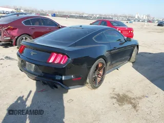 2017 Ford Mustang EcoBoost z VIN 1FA6P8TH1H5272339, wystawiony jako IAAI lot #41576468 z przebiegiem 125 455 mil mil oraz . Historia ofert i sprzedaży dostępna na DreamBid. Obrazek 4.
