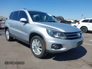 2013 Volkswagen Tiguan SE with VIN WVGAV7AX2DW527854, listed as a IAAI auction lot 42510852 with 137,258 mi miles and . Bid and sale history available at DreamBid. Image 1.