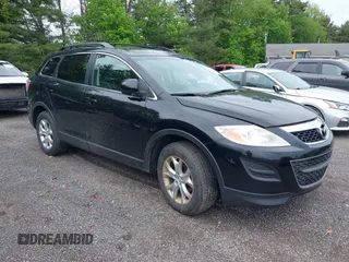 2011 Mazda CX-9 Touring z VIN JM3TB3CV6B0324256, wystawiony jako IAAI lot #42245746 z przebiegiem 128 420 mil mil oraz . Historia ofert i sprzedaży dostępna na DreamBid. Obrazek 1.