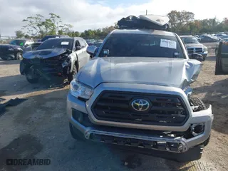 2018 Toyota Tacoma SR with VIN 5TFRX5GN6JX117009, listed as a IAAI auction lot 41195267 with 98,402 mi miles. Bid and sale history available at carsss.com. Image 11.