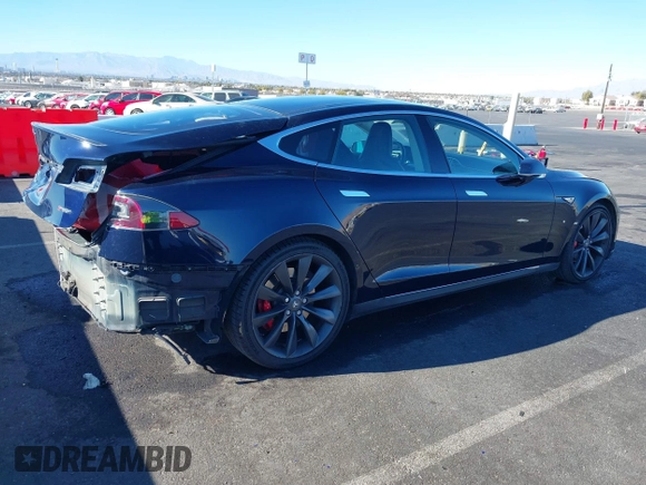 2014 Tesla Model S 60 with VIN 5YJSA1H14EFP57209, listed as a IAAI auction lot 41305157 with 141,364 mi miles and . Bid and sale history available at DreamBid. Image 4.