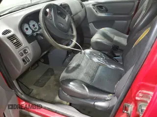 2001 Ford Escape XLS with VIN 1FMYU01181KD99269, listed as a Copart auction lot 88463335 with 217,537 mi miles and Salvage title. Bid and sale history available at DreamBid. Image 7.
