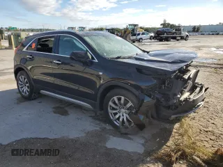 2020 Cadillac XT4 FWD Premium Luxury z VIN 1GYFZCR4XLF070463, wystawiony jako Copart lot #58873345 z przebiegiem 88 406 mil mil oraz Nie do naprawy. Historia ofert i sprzedaży dostępna na DreamBid. Obrazek 4.