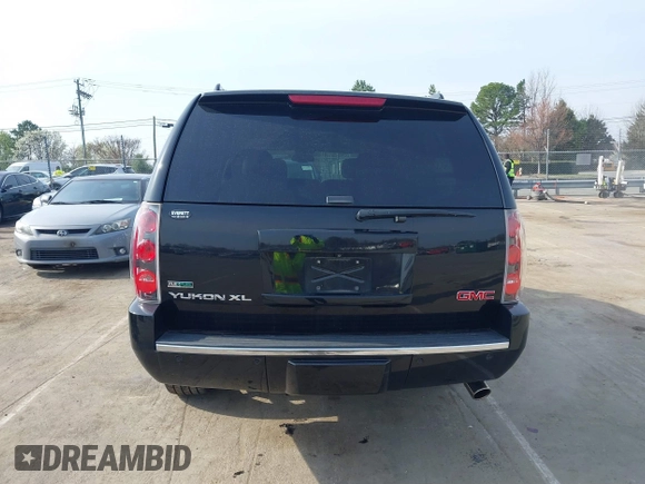 2012 GMC Yukon XL Denali with VIN 1GKS2MEF2CR252084, listed as a IAAI auction lot 41802335 with 88,958 mi miles. Bid and sale history available at carsss.com. Image 16.