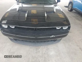 2016 Dodge Challenger SXT z VIN 2C3CDZAG7GH317012, wystawiony jako Copart lot #55610745 z przebiegiem 106 917 mil mil oraz Szkoda całkowita • Salvage title. Historia ofert i sprzedaży dostępna na DreamBid. Obrazek 11.