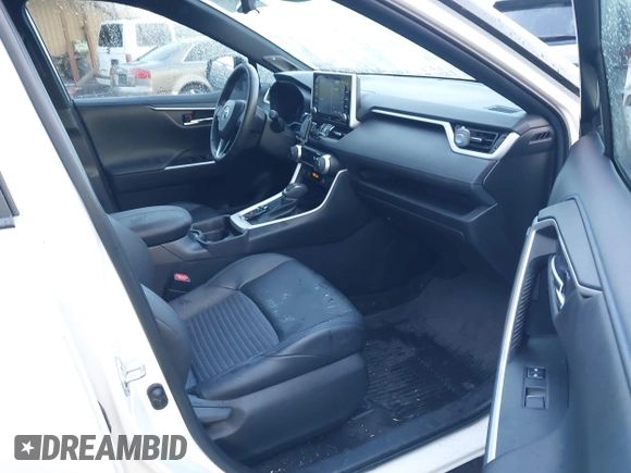 2021 Toyota RAV4 Hybrid XSE with VIN 4T3E6RFV8MU056524, listed as a IAAI auction lot 41788452 with 56,751 mi miles. Bid and sale history available at carsss.com. Image 5.