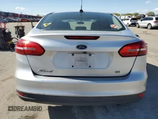 2018 Ford Focus SE z VIN 1FADP3F29JL206110, wystawiony jako Copart lot #53953515 z przebiegiem 80 841 mil mil oraz Szkoda całkowita • Salvage title. Historia ofert i sprzedaży dostępna na DreamBid. Obrazek 6.