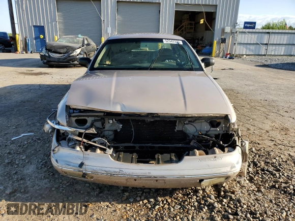 1997 Mercury Grand Marquis LS with VIN 2MELM75W3VX692074, listed as a Copart auction lot 52542335 with 211,850 mi miles and Salvage Title. Bid and sale history available at DreamBid. Image 5.