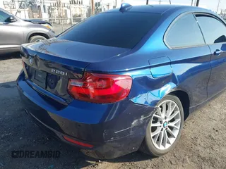 2015 BMW 2 Series 228i xDrive with VIN WBA1F7C5XFV367287, listed as a IAAI auction lot 40802463 with 113,427 mi miles and . Bid and sale history available at carsss.com. Image 6.