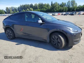 2024 Tesla Model Y Long Range with VIN 7SAYGDEE9RF120729, listed as a Copart auction lot 57360265 with 21,589 mi miles and Salvage title. Bid and sale history available at DreamBid. Image 4.