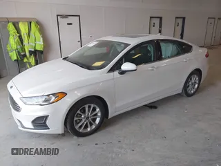 2020 Ford Fusion SE with VIN 3FA6P0HD4LR165511, listed as a IAAI auction lot 42136252 with 30,709 mi miles and . Bid and sale history available at DreamBid. Image 2.