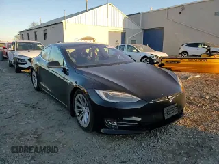2019 Tesla Model S 75D with VIN 5YJSA1E23KF330239, listed as a Copart auction lot 86737544 with Not provided miles and Salvage title. Bid and sale history available at DreamBid. Image 15.