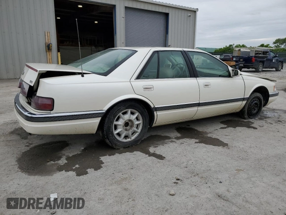 1997 Cadillac Seville Luxury SLS z VIN 1G6KS52Y0VU819998, wystawiony jako Copart lot #55979335 z przebiegiem 87 054 mil mil oraz Szkoda całkowita • Salvage title. Historia ofert i sprzedaży dostępna na DreamBid. Obrazek 3.