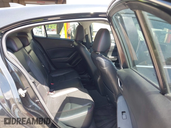 2016 Mazda 3 S Grand Touring z VIN JM1BM1N37G1287136, wystawiony jako IAAI lot #42171368 z przebiegiem 155 685 mil mil oraz . Historia ofert i sprzedaży dostępna na DreamBid. Obrazek 8.