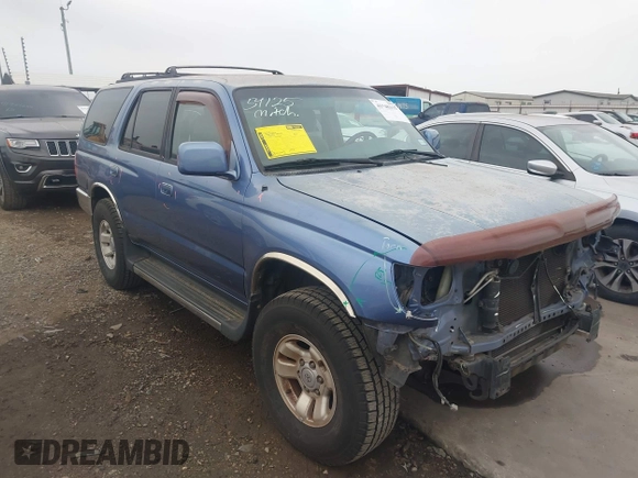 1999 Toyota 4Runner SR5 with VIN JT3GN86R1X0097244, listed as a IAAI auction lot 41948315 with 128,531 mi miles and . Bid and sale history available at DreamBid. Image 1.