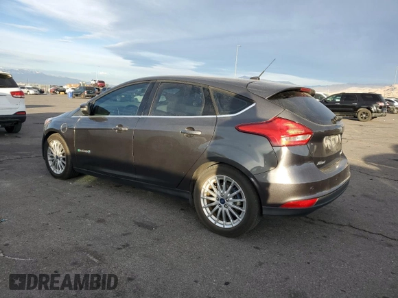 2015 Ford Focus Electric with VIN 1FADP3R40FL348785, listed as a Copart auction lot 84516374 with 85,633 mi miles and Salvage title. Bid and sale history available at DreamBid. Image 2.