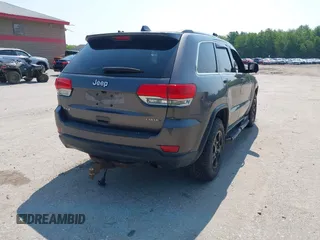 2015 Jeep Grand Cherokee Altitude with VIN 1C4RJFAG5FC710943, listed as a IAAI auction lot 42430708 with 163,776 mi miles and . Bid and sale history available at DreamBid. Image 4.