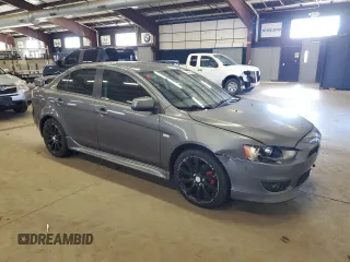 2011 Mitsubishi Lancer GTS with VIN JA32U8FW0BU033131, listed as a Copart auction lot 42211295 with 160,890 mi miles and Clean Title. Bid and sale history available at carsss.com. Image 4.