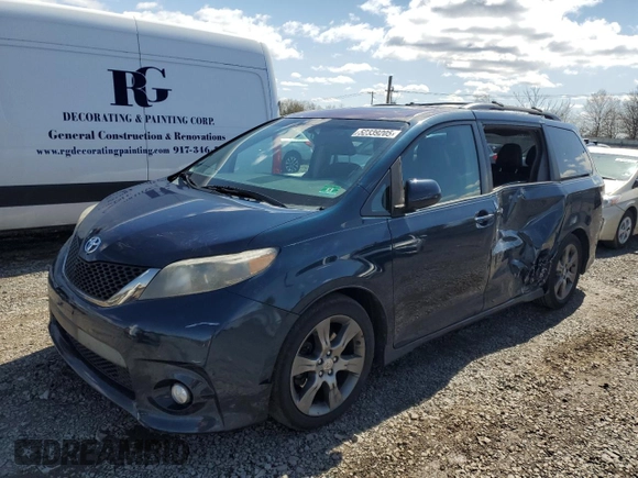 2012 Toyota Sienna SE with VIN 5TDXK3DC7CS251937, listed as a Copart auction lot 52339205 with 219,797 mi miles and Salvage Title. Bid and sale history available at carsss.com. Image 1.