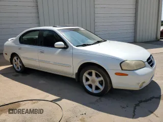 2000 Nissan Maxima GXE z VIN JN1CA31D3YT537410, wystawiony jako Copart lot #68046964 z przebiegiem 313 180 mil mil oraz Czysty tytuł • Clean title. Historia ofert i sprzedaży dostępna na DreamBid. Obrazek 4.