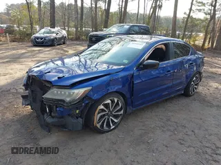 2016 Acura ILX w/Premium/A-SPEC Pkg with VIN 19UDE2F8XGA005725, listed as a IAAI auction lot 41844542 with 164,136 mi miles. Bid and sale history available at carsss.com. Image 2.