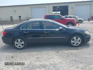2005 Acura RL z VIN JH4KB16545C018873, wystawiony jako IAAI lot #42423476 z przebiegiem 237 834 mil mil oraz . Historia ofert i sprzedaży dostępna na DreamBid. Obrazek 13.