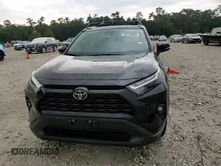 2023 Toyota RAV4 XLE Premium with VIN 2T3C1RFV0PC241193, listed as a Copart auction lot 58708005 with 19,154 mi miles and Salvage title. Bid and sale history available at DreamBid. Image 14.