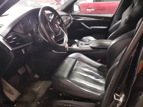 2015 BMW X5 M with VIN 5YMKT6C58F0C89657, listed as a Copart auction lot 77462264 with 110,706 mi miles and Clean Title. Bid and sale history available at carsss.com. Image 7.