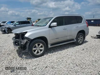 2012 Lexus GX 460 z VIN JTJBM7FX5C5049211, wystawiony jako Copart lot #54648185 z przebiegiem 252 501 mil mil oraz Szkoda całkowita • Salvage title. Historia ofert i sprzedaży dostępna na DreamBid. Obrazek 1.